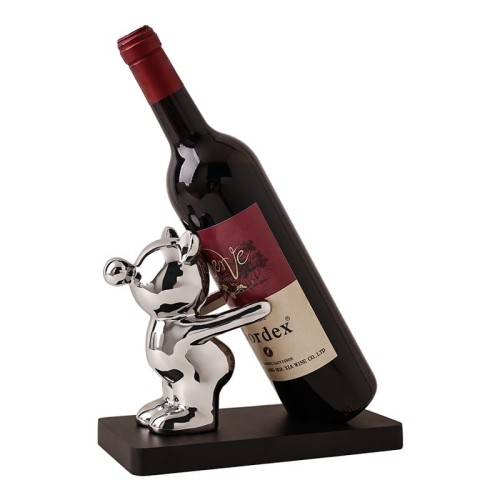 Stojak na wino butelkę dekoracyjny z figurką srebrną